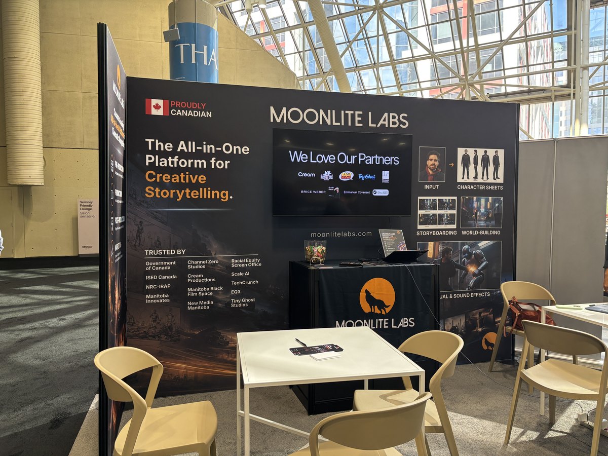 The Moonlite Labs booth with the screen reading We Love Our Partners above partner logos
